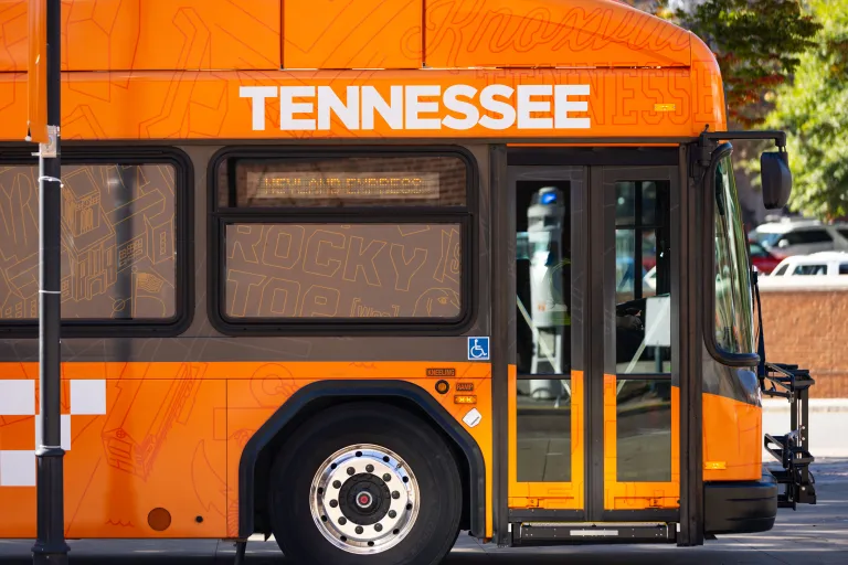 Orange T bus on campus